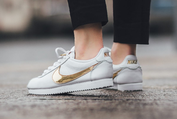 Nike cortez sales gold swoosh