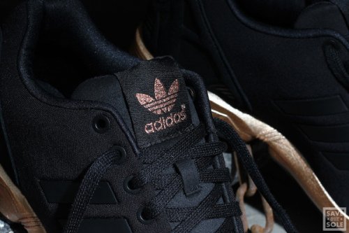adidas black and bronze flux