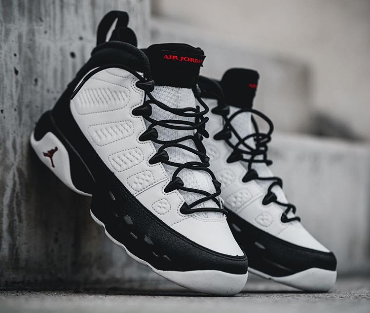 white and black jordan 9s