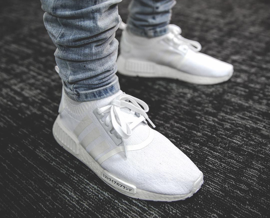 white nmd on feet