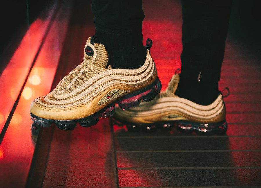 gold vapormax 97 on feet