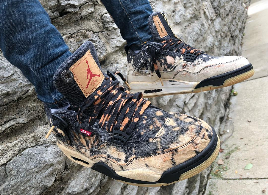 levis black jordan 4