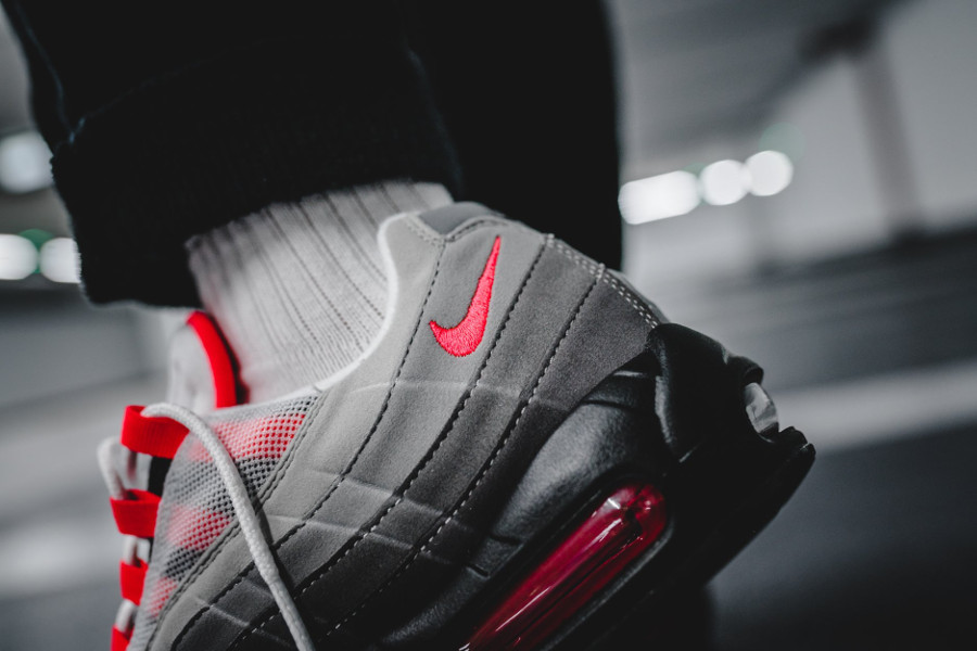 air max 95 og solar red on feet