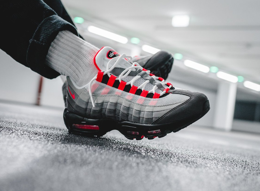 air max 95 solar red on feet