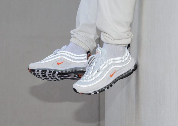 silver and orange air max