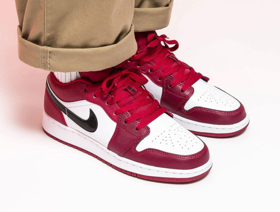 jordan 1 low noble red on feet