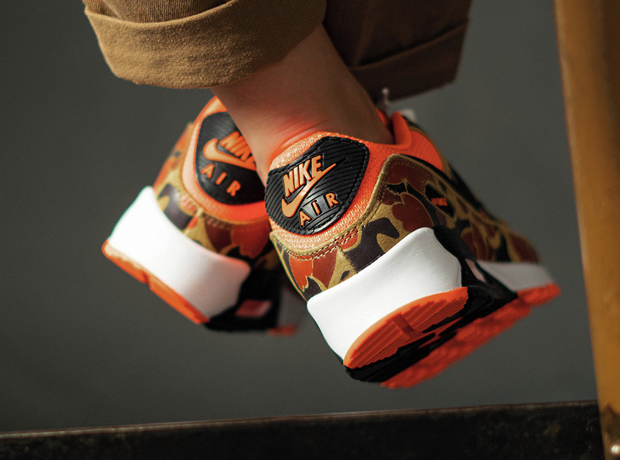 Nike Air Max 90 Premium Orange Duck Camo on feet (1)