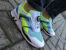 Puma Trinomic XS7000 blanche verte et jaune on feet