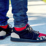 Sole Fly x Air Jordan 1 Low 'Carnivore' Black and Sport Red