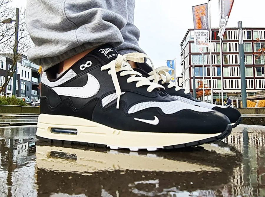 Patta x Nike Air Max 1 Wave 'Black Metallic Silver' on feet