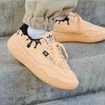 Adidas W Her Court ‘Acid Orange’ on feet GY3581