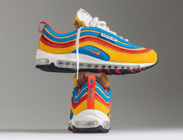 Nike AM97 SE AMRC Running Club Pack Pollen Orange 600x457