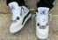 Air Jordan 4 Retro blanche et noire on feet (3)