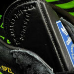 adidas Samba noire et verte (couture sur la toe box en T) (couv)