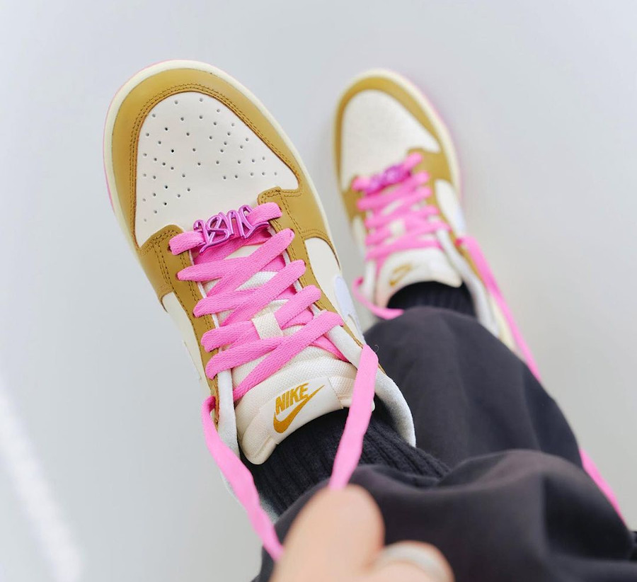 Nike Dunk Low SE Bronzine Pink Just Do It on feet