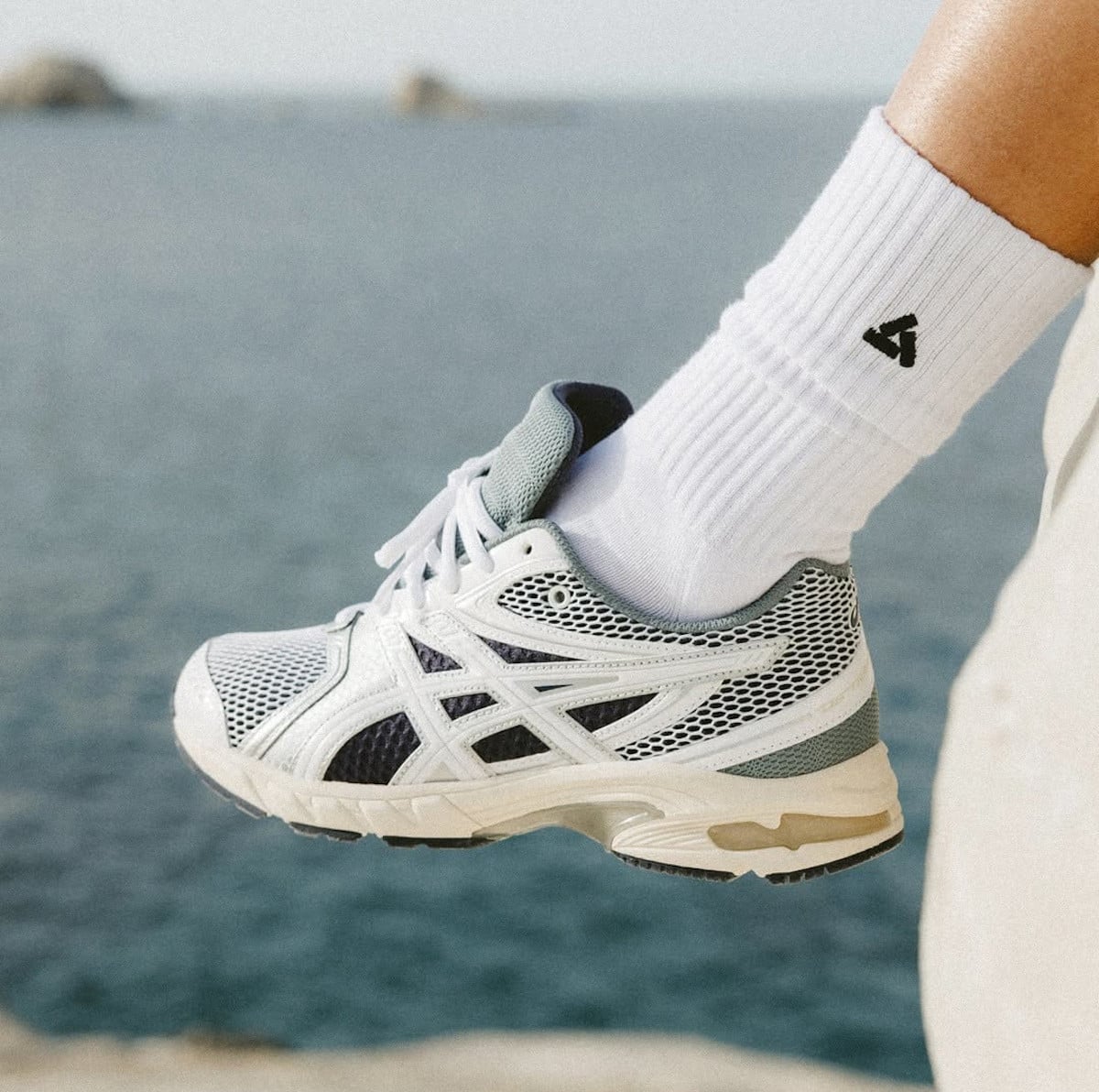 Asics Gel DS Trainer 14 blanche grise et argentée 1203A607-100